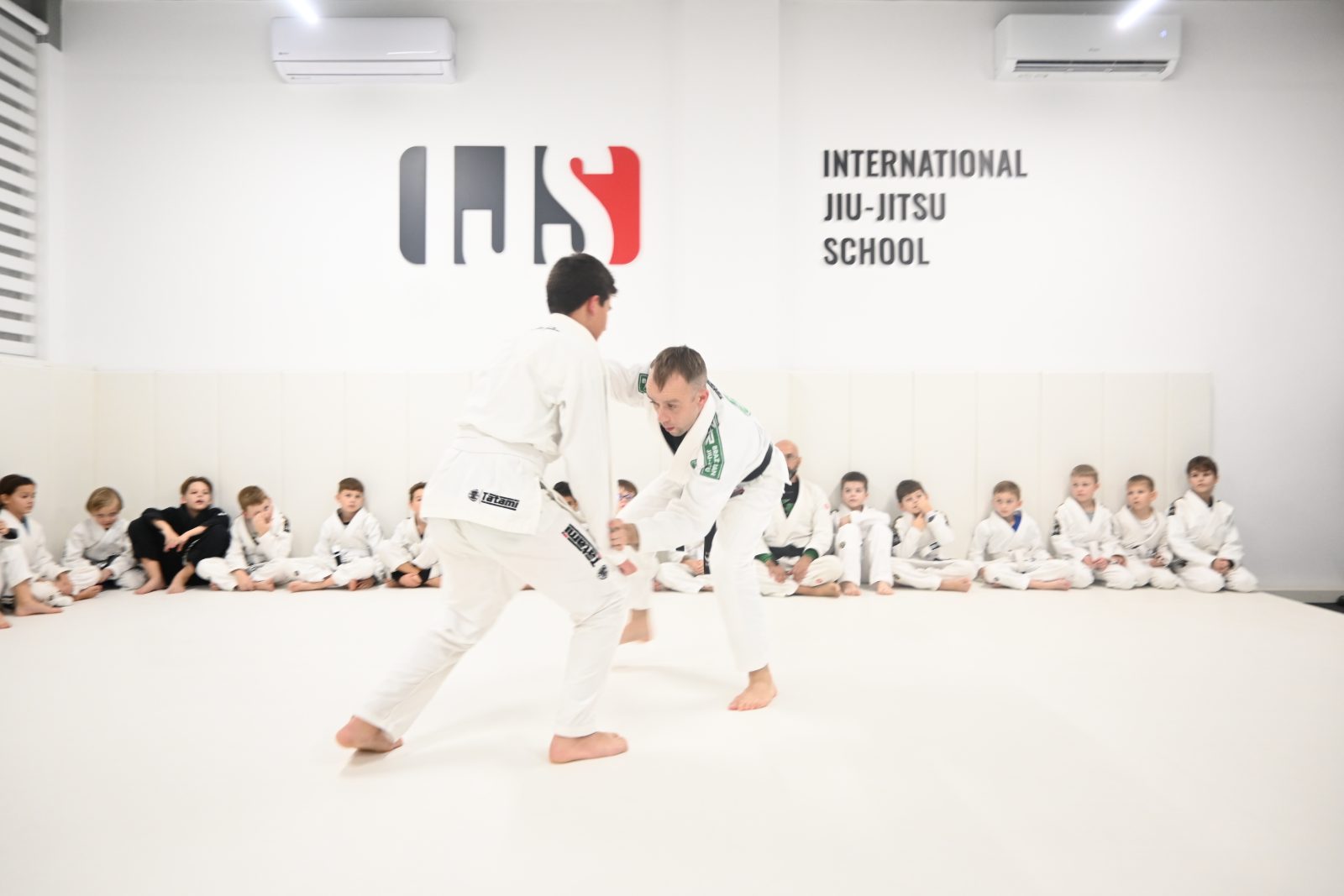 Sparring with kids watching