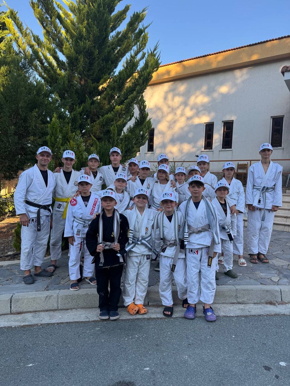 Summer Camp gi team photo at sunset