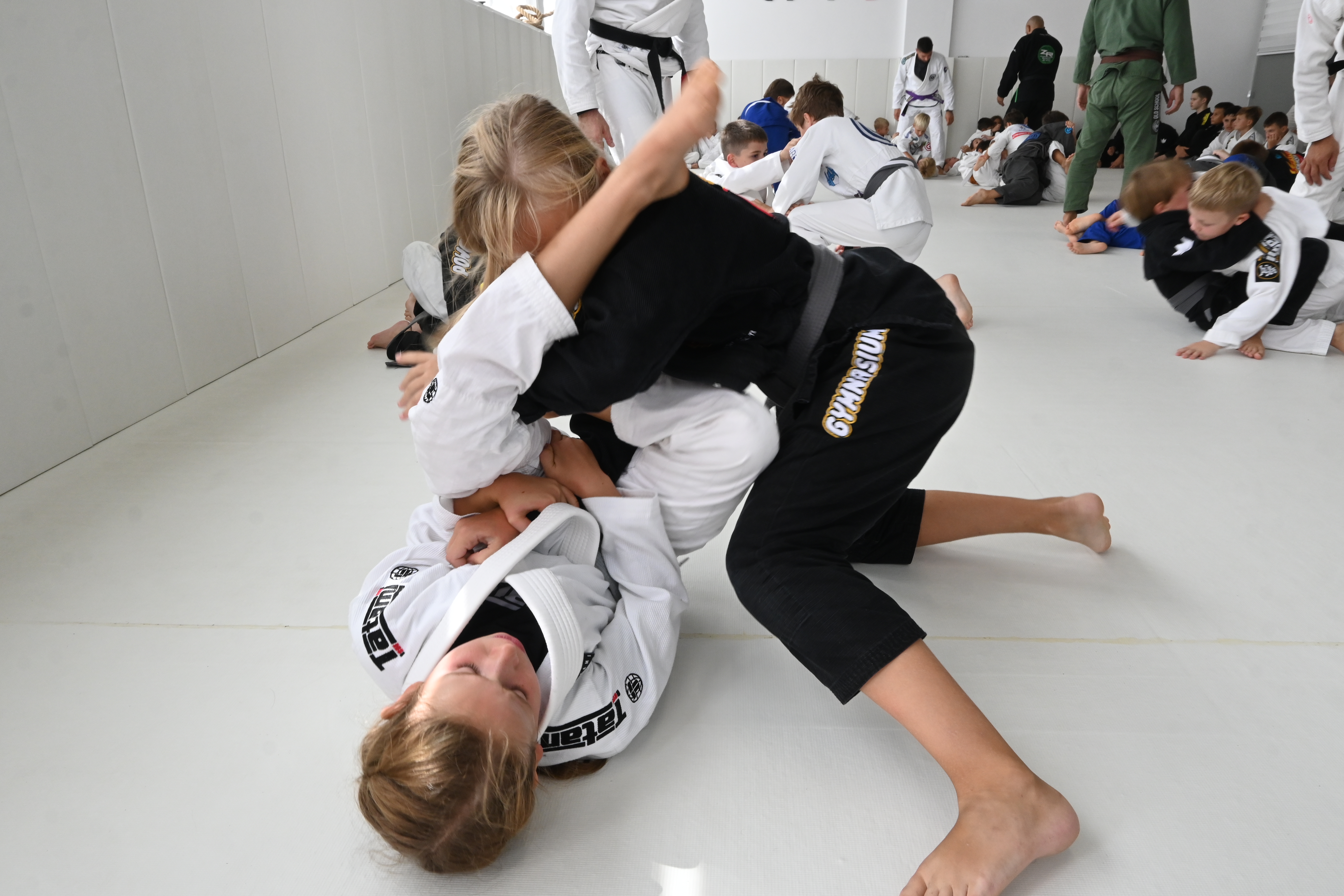 Kids grappling at competition