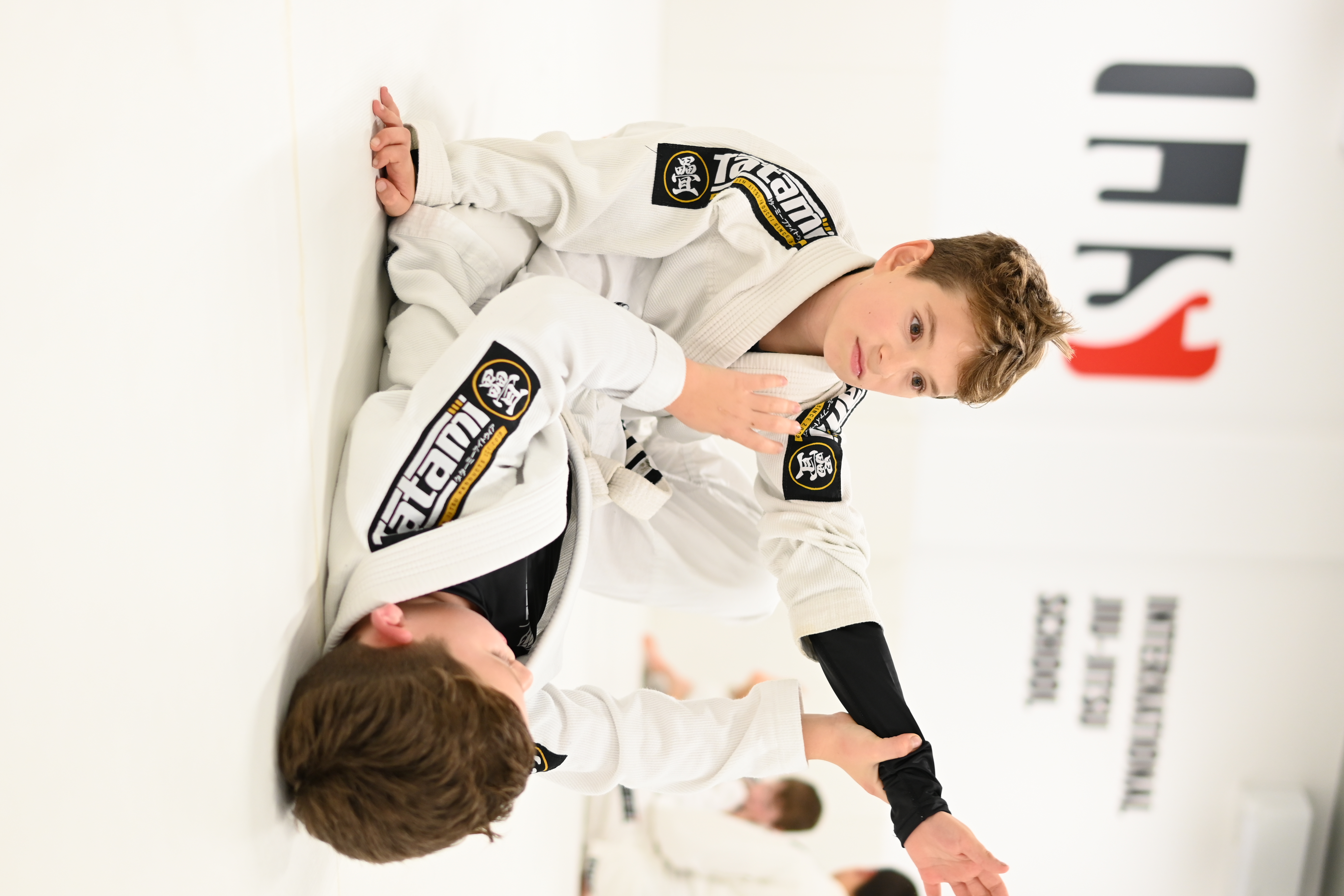 Boy explaining drill to training partner