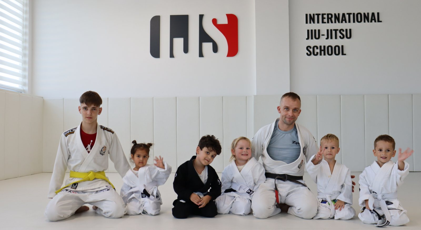 Tiny Tigers — youngest students waving